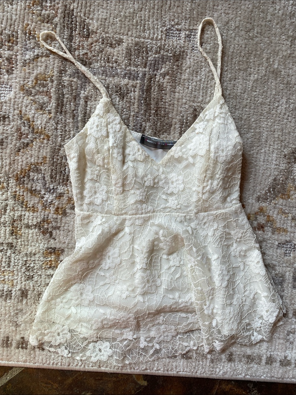 happening in the present Cream Lace Camisole